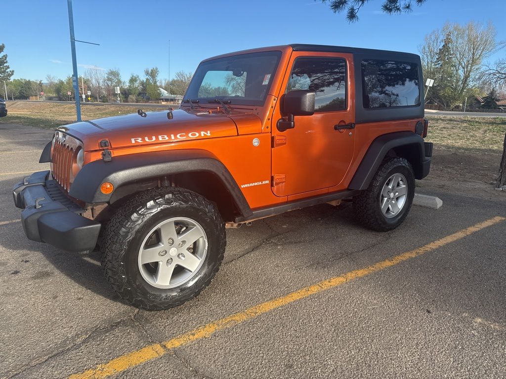 Orange (Mango Tango Pearlcoat) 2011 Jeep Wrangler Rubicon 4WD SUV / Crossover Four-Wheel Drive 4-Speed Automatic