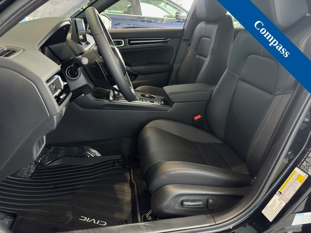 2026 Honda Civic Hybrid Sport Touring Black at Shottenkirk Kia Fort Bend