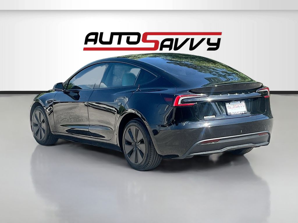 2025 Tesla Model 3 Long Range Black at AutoSavvy Houston Northwest