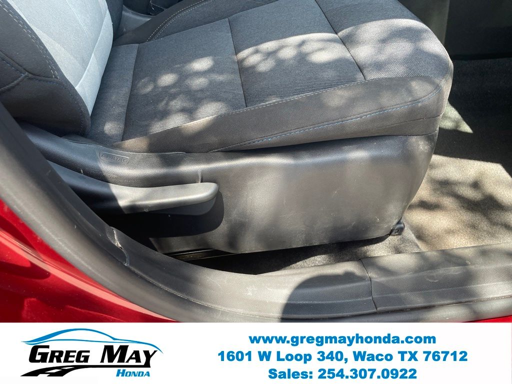 2025 Chevrolet Trax LS Red at Greg May Honda