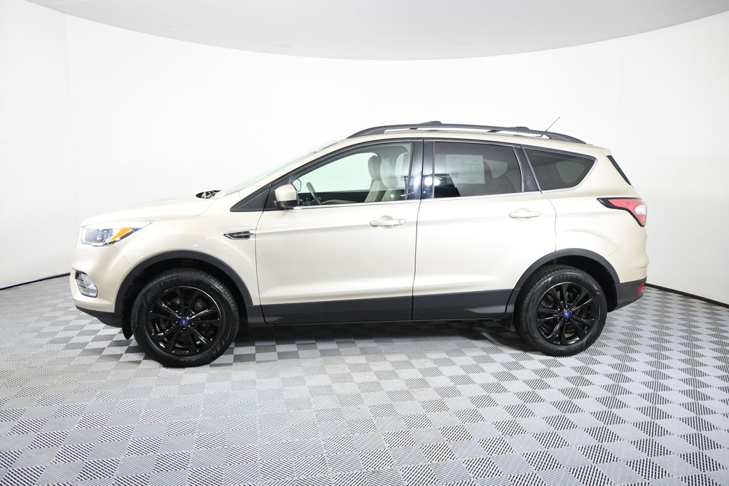 Used 2018 Ford Escape SE with VIN 1FMCU9GD7JUA64377 for sale in Forest Lake, Minnesota