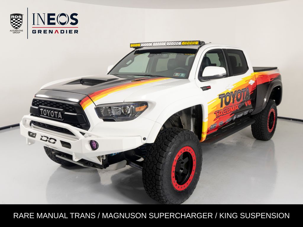 Super White 2018 Toyota Tacoma Pickup Truck Four-Wheel Drive 6-Speed Manual