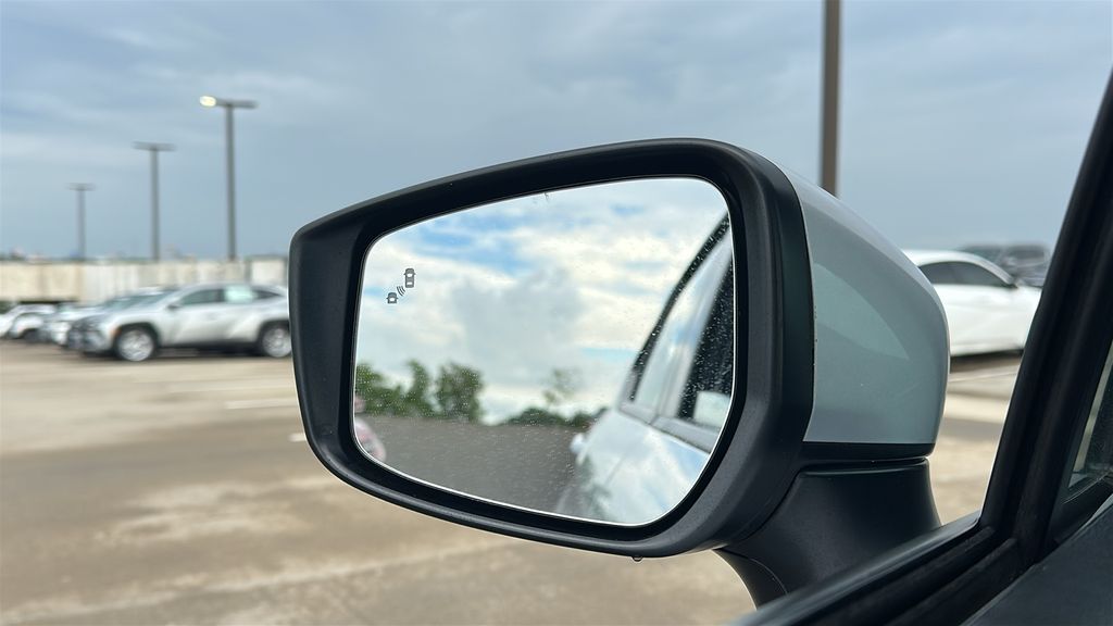 2025 Nissan Versa 1.6 SV Silver at South Houston Nissan