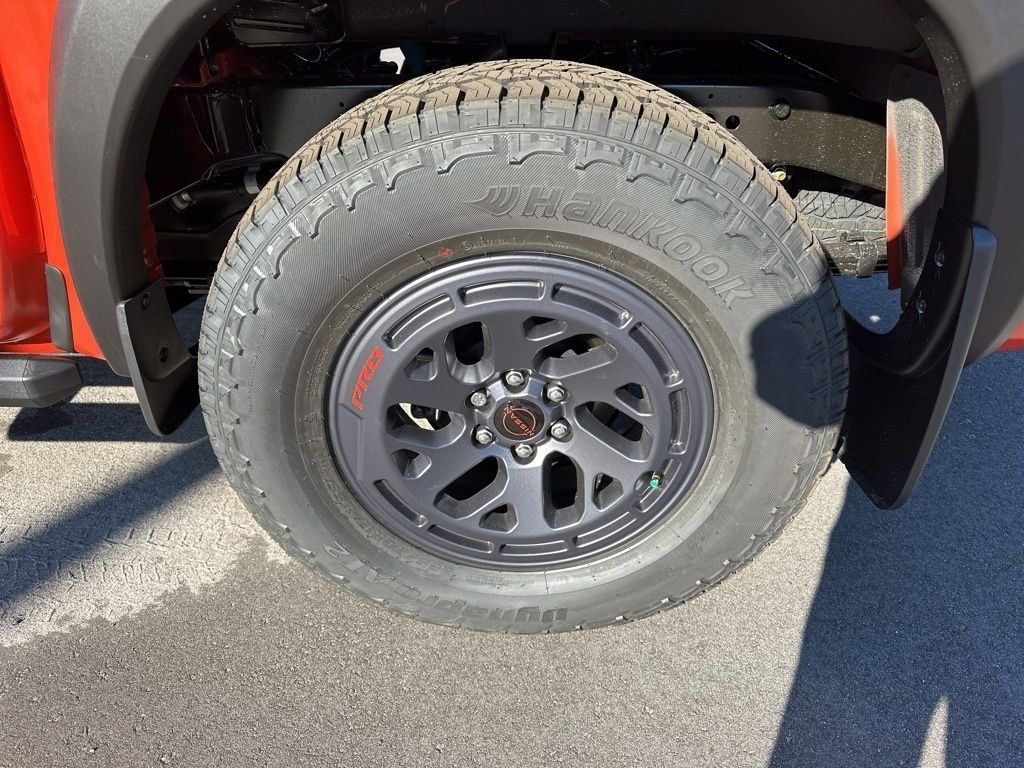 2025 Afterburn Orange Nissan Frontier PRO-4X 4X4 Truck