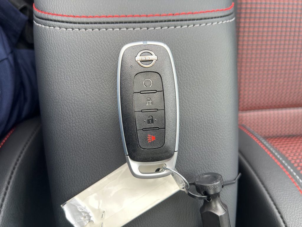 2025 Scarlet Ember Tintcoat Nissan Kicks SR FWD SUV