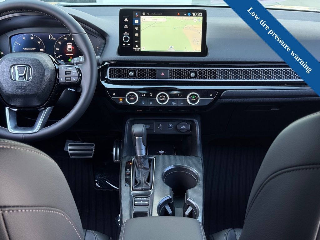 2026 Honda Civic Hybrid Sport Touring Silver at Community Honda