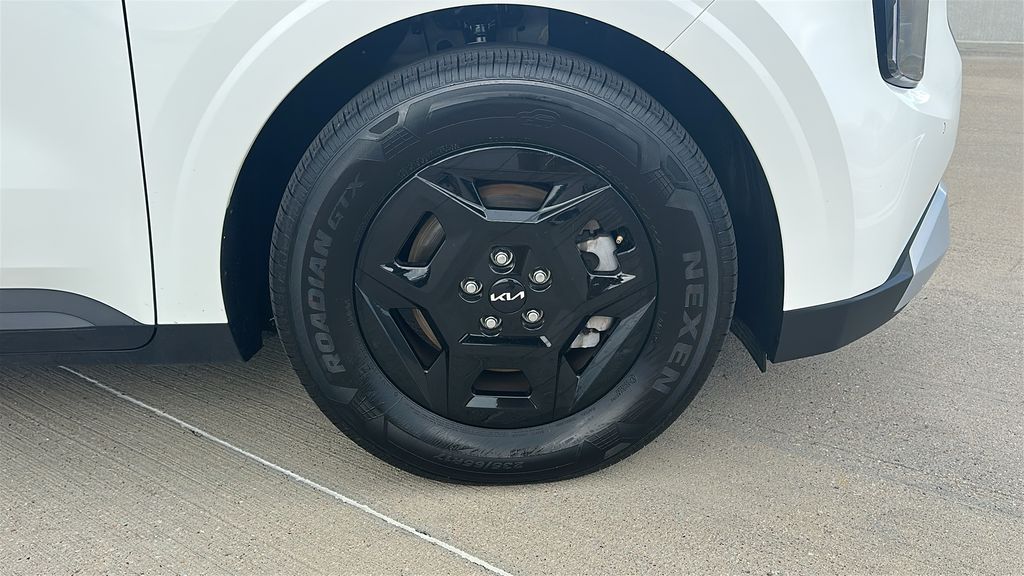 2026 Kia Carnival LXS White at DeMontrond Automotive Group