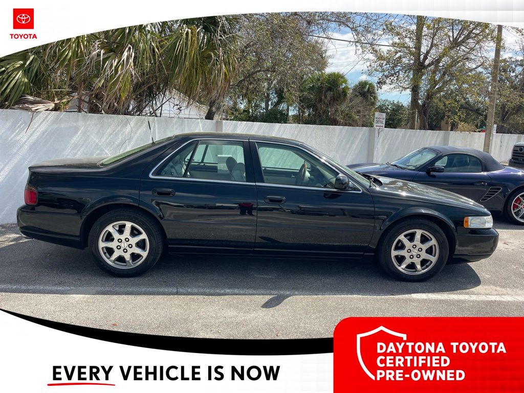 Used 2003 Cadillac Seville STS with VIN 1G6KY54993U155718 for sale in Daytona Beach, FL