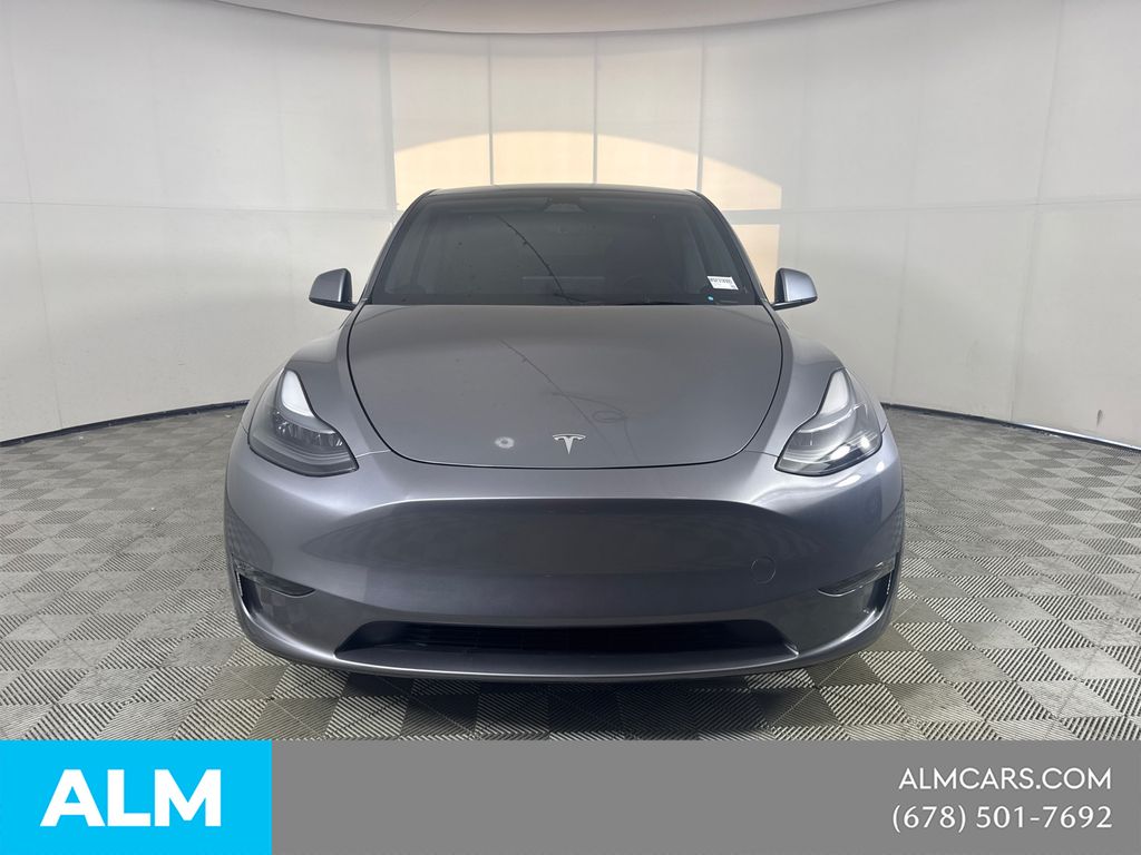 Used 2025 Tesla Model Y Long Range with VIN 7SAYGDEE2SF318395 for sale in Morrow, GA