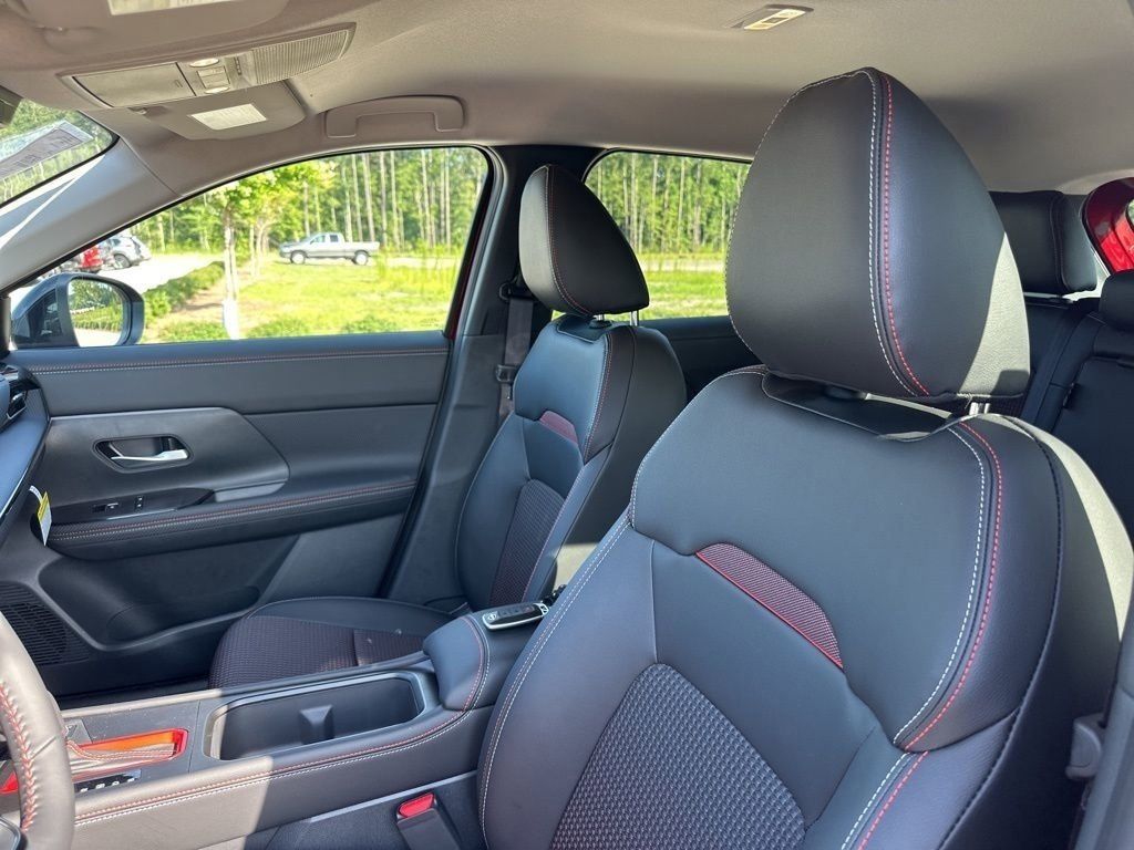 2025 Scarlet Ember Tintcoat/Super Black Nissan Kicks SR FWD SUV
