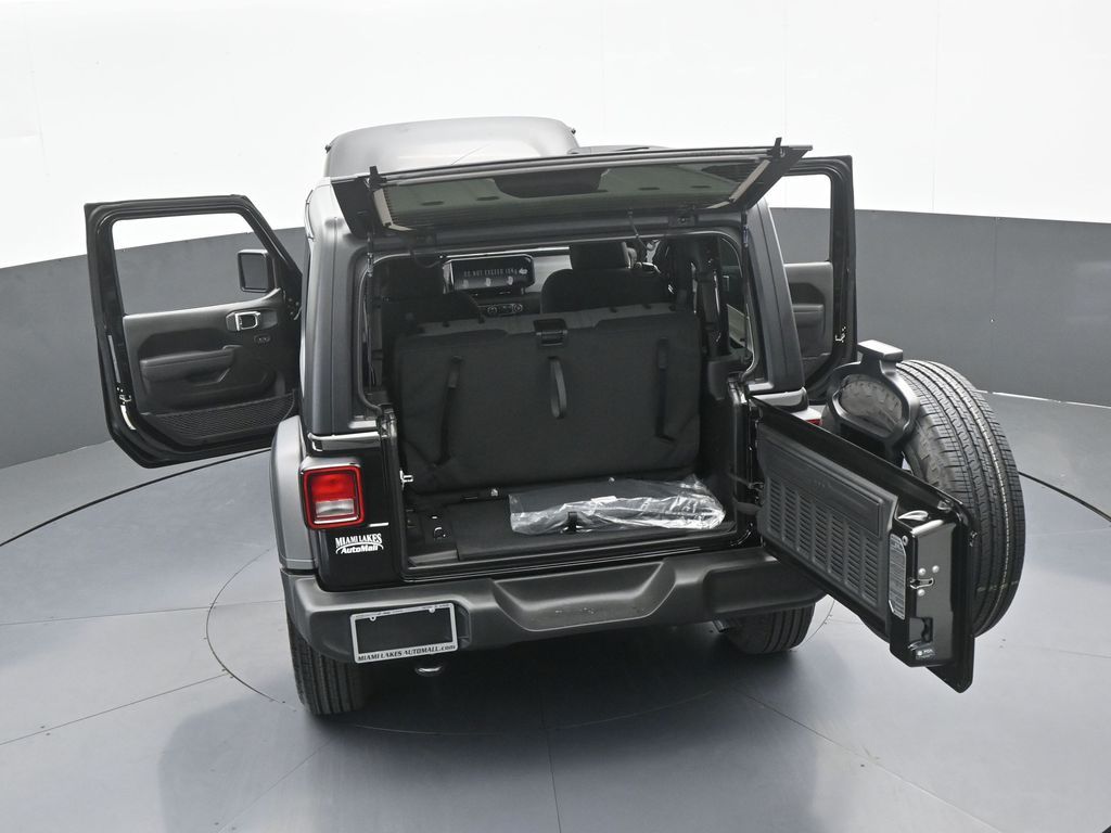 New 2026 black clearcoat Jeep Sport image 56