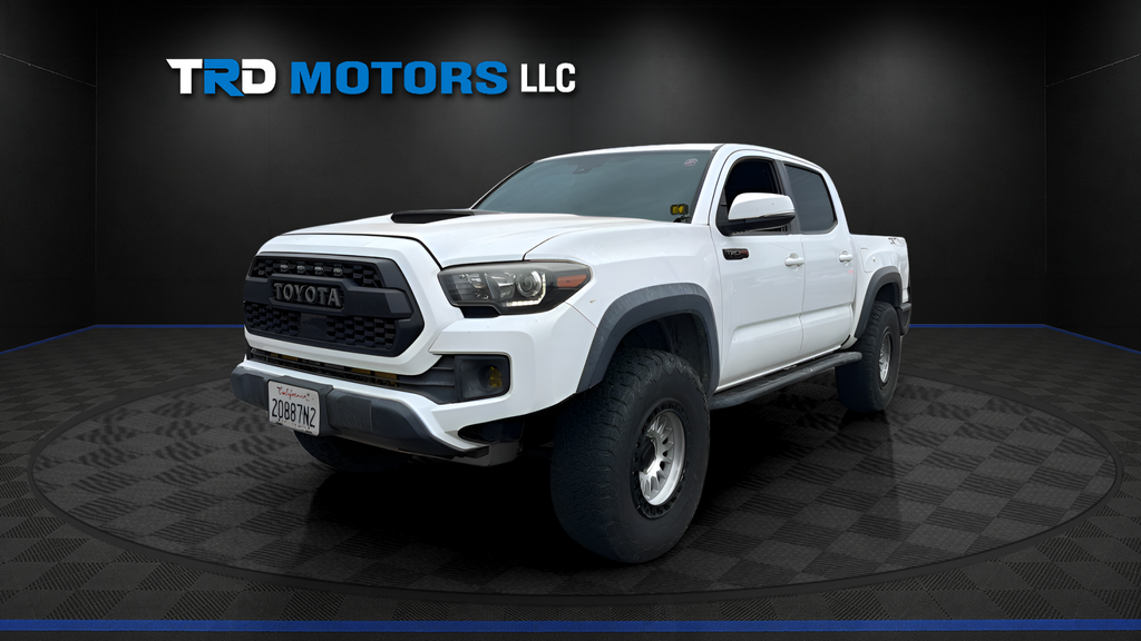 Super White 2018 Toyota Tacoma Pickup Truck Four-Wheel Drive 6-Speed Automatic