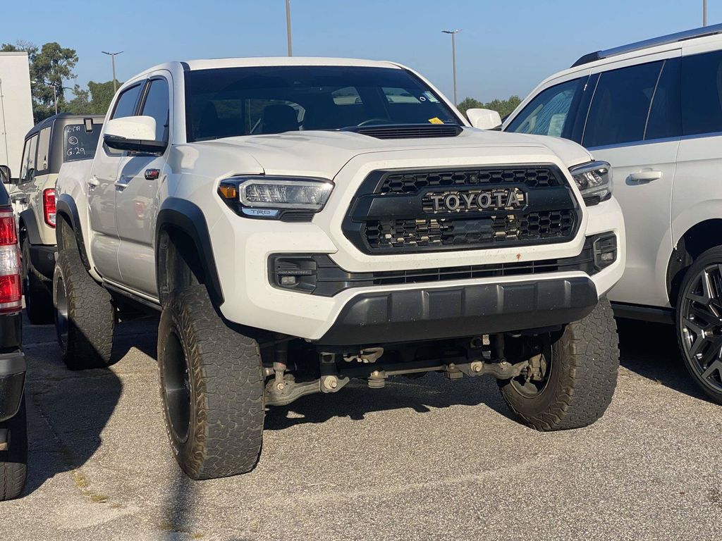 White 2021 Toyota Tacoma Pickup Truck Four-Wheel Drive 6-Speed Manual