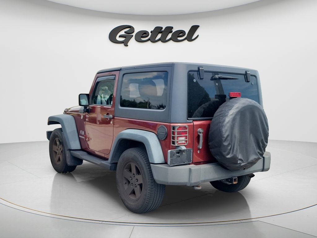 Used 2009 Red Jeep X image 2