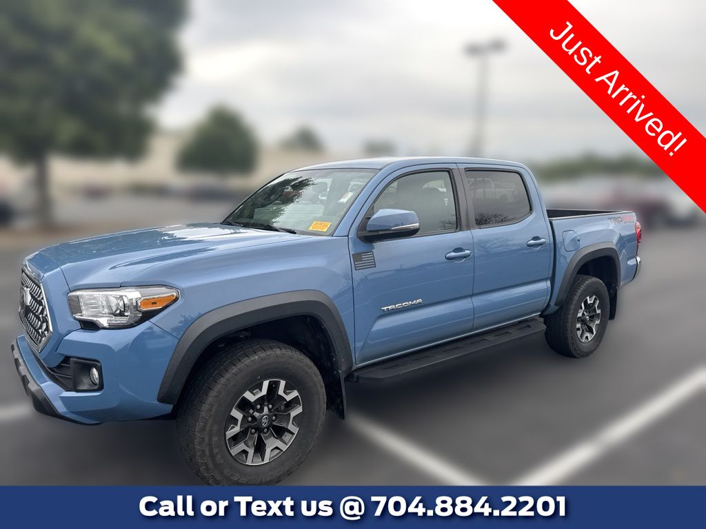 Blue 2019 Toyota Tacoma Pickup Truck Four-Wheel Drive 6-Speed Manual