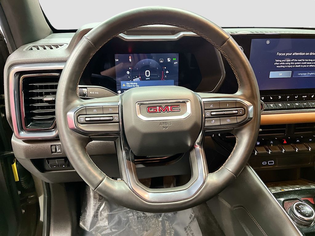 Used 2023 Deep Bronze Metallic GMC AT4 image 11