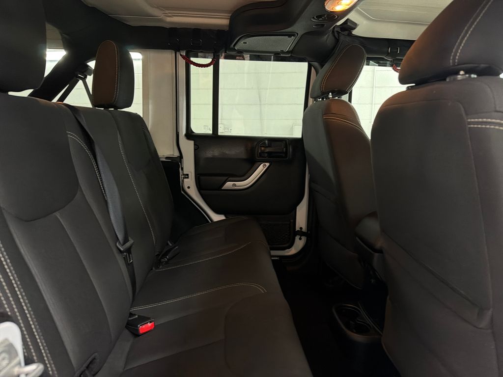Used 2018 White Jeep Unlimited Sahara image 26