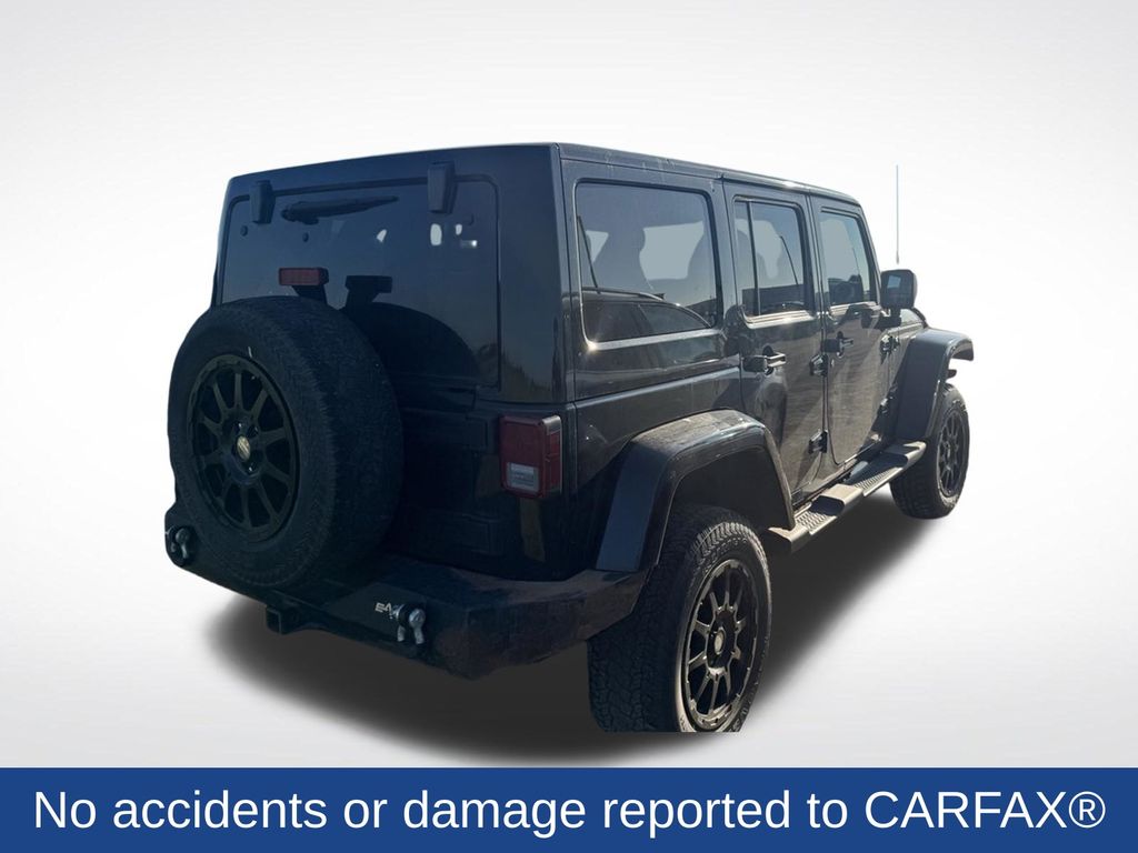 Used 2012 Jeep Wrangler Unlimited Sahara with VIN 1C4BJWEG8CL232007 for sale in Marshall, Minnesota