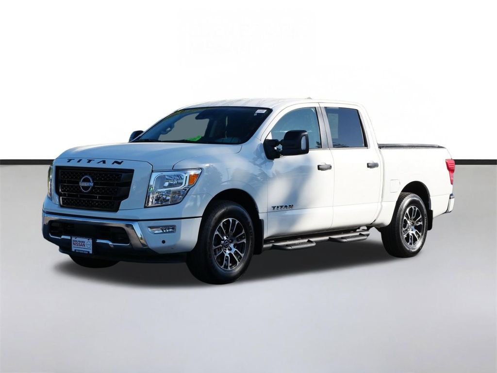 Glacier White 2023 Nissan Titan Pickup Truck Four-Wheel Drive 9-Speed Automatic