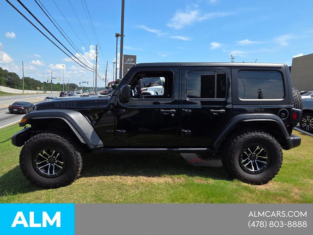 Used 2024 Black Jeep Sport image 3