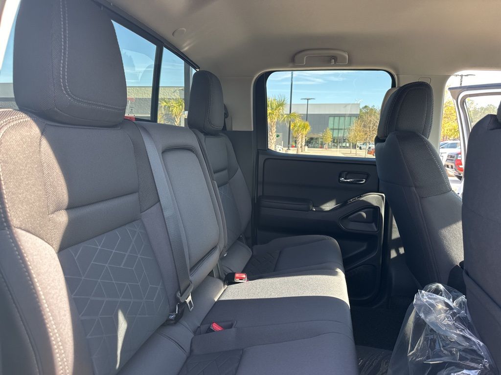 2025 Glacier White Nissan Frontier SV 4X4 Truck