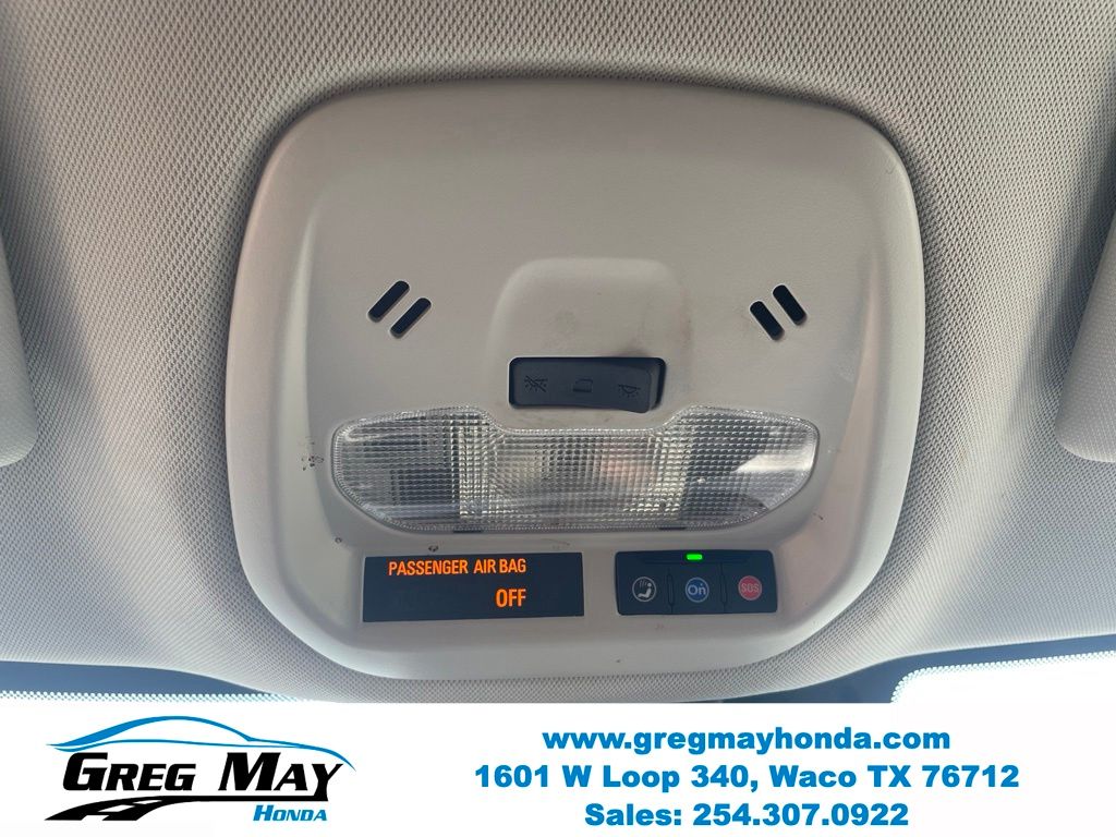 2025 Chevrolet Trax LS Red at Greg May Honda