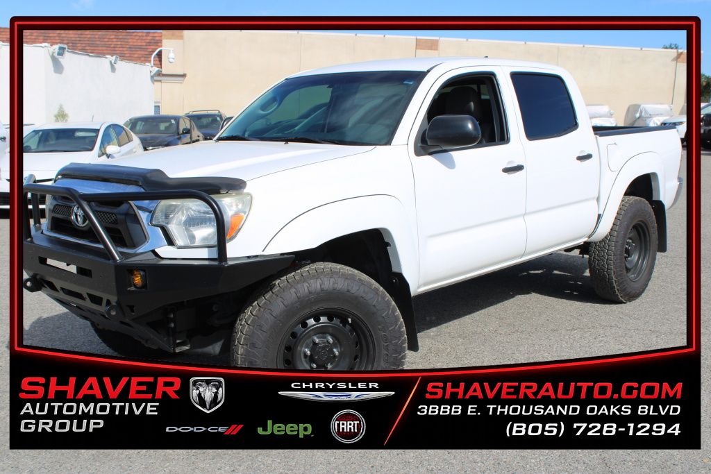 Super White 2015 Toyota Tacoma Pickup Truck Four-Wheel Drive 6-Speed Manual