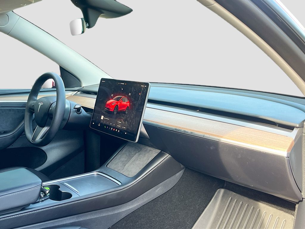 2025 Tesla Model Y Long Range Red at AutoSavvy Houston Northwest