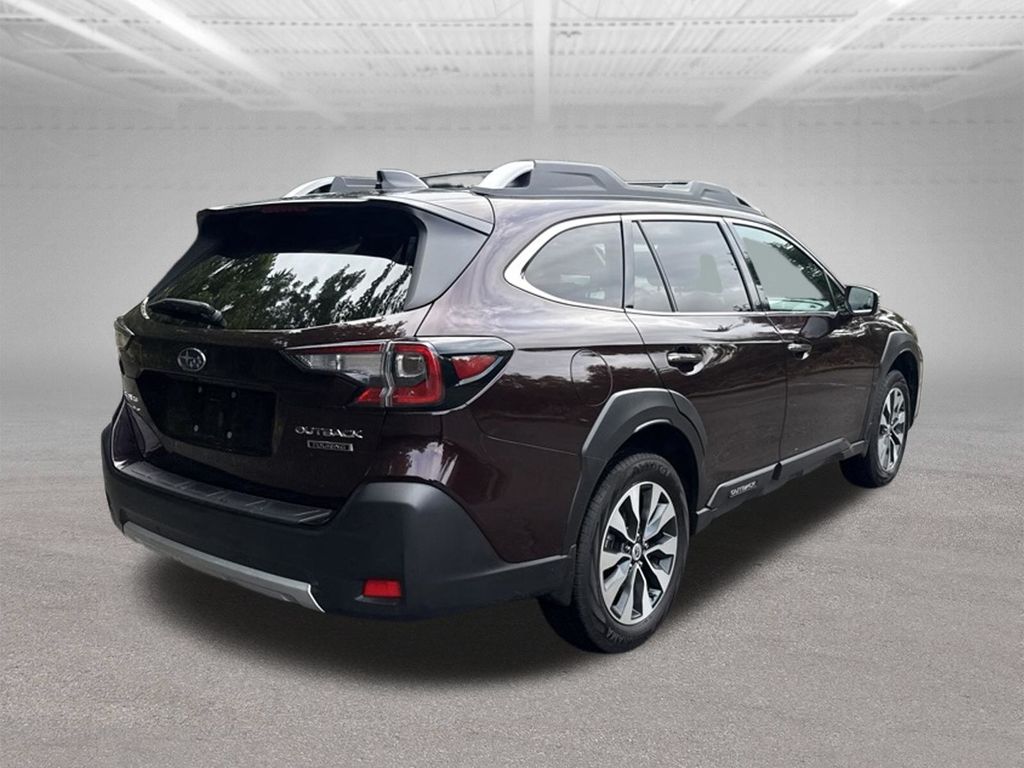2025 Subaru Outback Touring Red at Rafferty Subaru