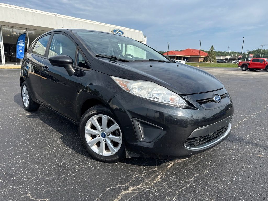 Tuxedo Black Metallic 2011 Ford Fiesta Hatchback Front-Wheel Drive 6-Speed Automatic