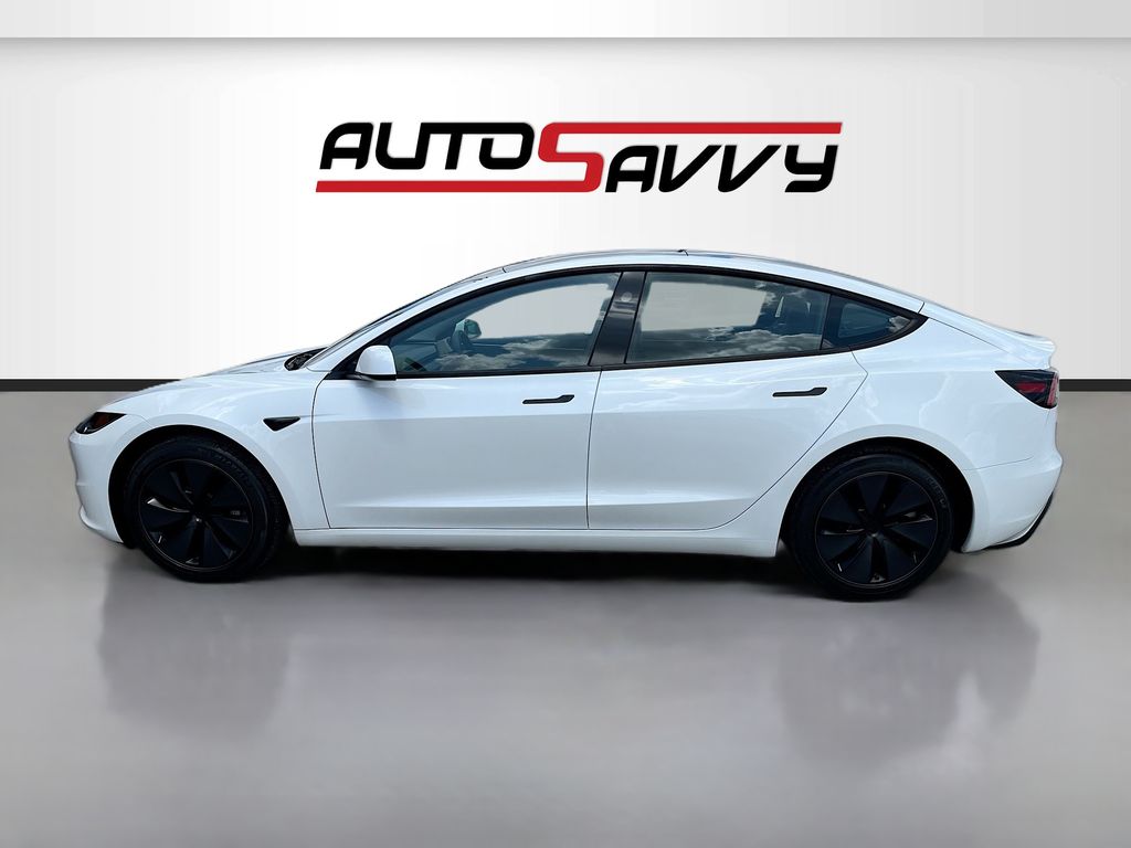 2025 Tesla Model 3 Long Range White at AutoSavvy Houston Northwest