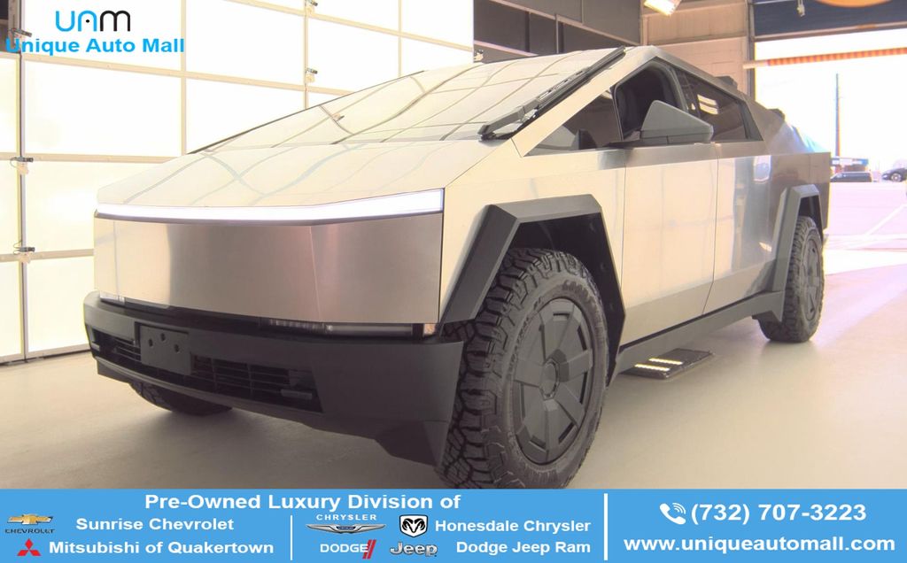 Silver 2024 Tesla Cybertruck Crew Cab AWD Pickup Truck All-Wheel Drive 1-Speed Automatic