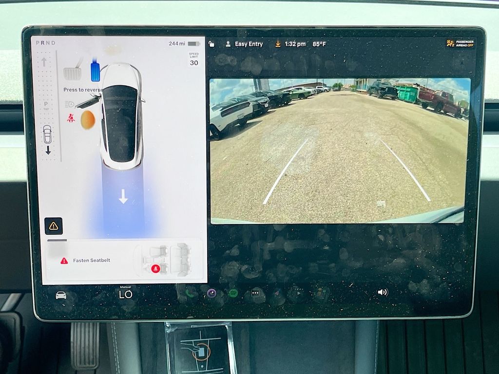 2025 Tesla Model 3 Long Range White at AutoSavvy Houston Northwest