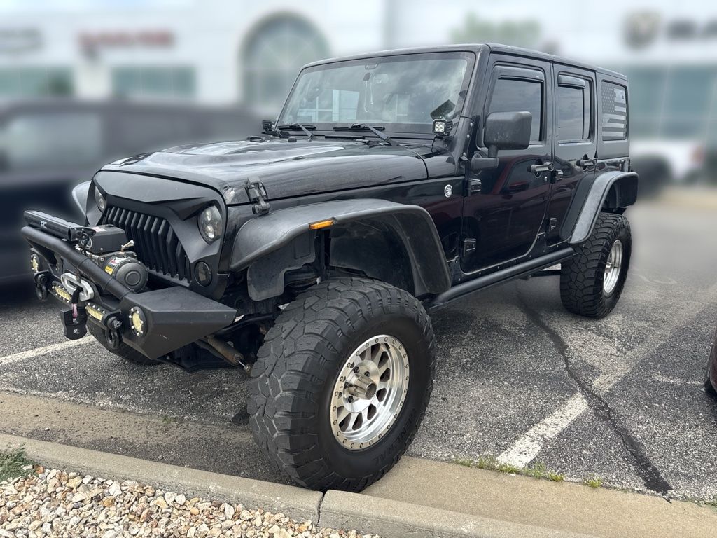 Used 2013 Jeep Wrangler Unlimited Rubicon with VIN 1C4BJWFG5DL538291 for sale in Kansas City