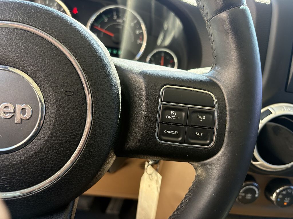 2014 Jeep Wrangler Unlimited Sahara White at Autostrade