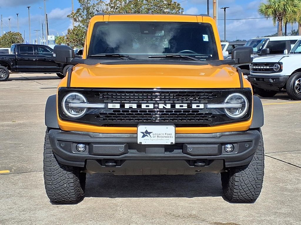 2022 Ford Bronco Wildtrak Orange at AutoSavvy Houston Northwest