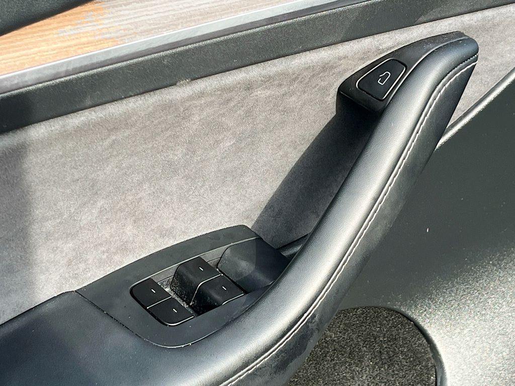 2025 Tesla Model Y Long Range Red at AutoSavvy Houston Northwest