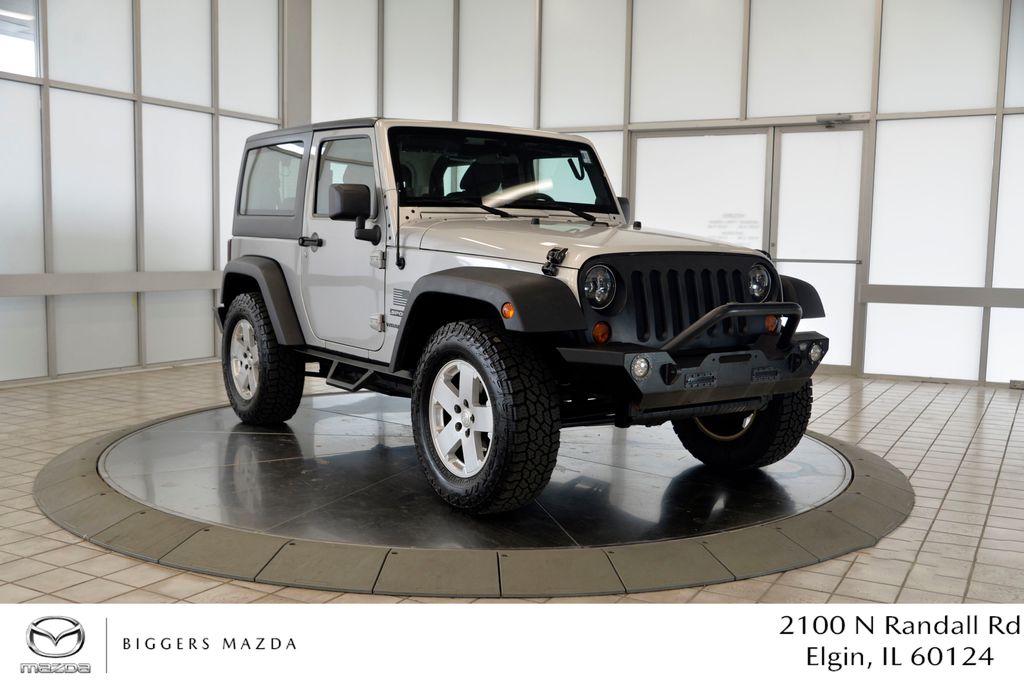 Bright Silver Metallic Clearcoat 2012 Jeep Wrangler Sport 4WD SUV / Crossover Four-Wheel Drive 5-Speed Automatic