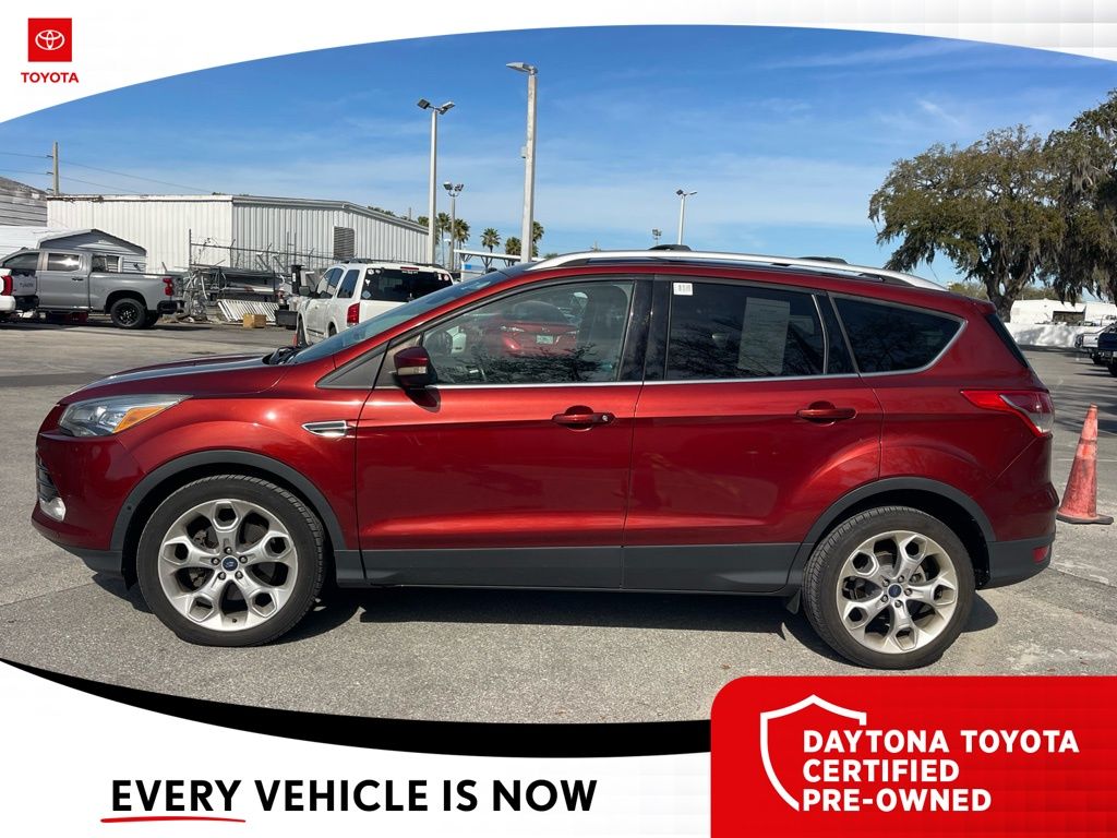 Used 2014 Ford Escape Titanium with VIN 1FMCU9J91EUE39593 for sale in Daytona Beach, FL