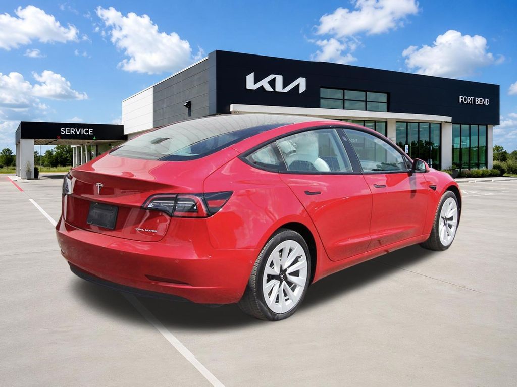 2022 Tesla Model 3 Long Range Red at Ultimate Motorsports
