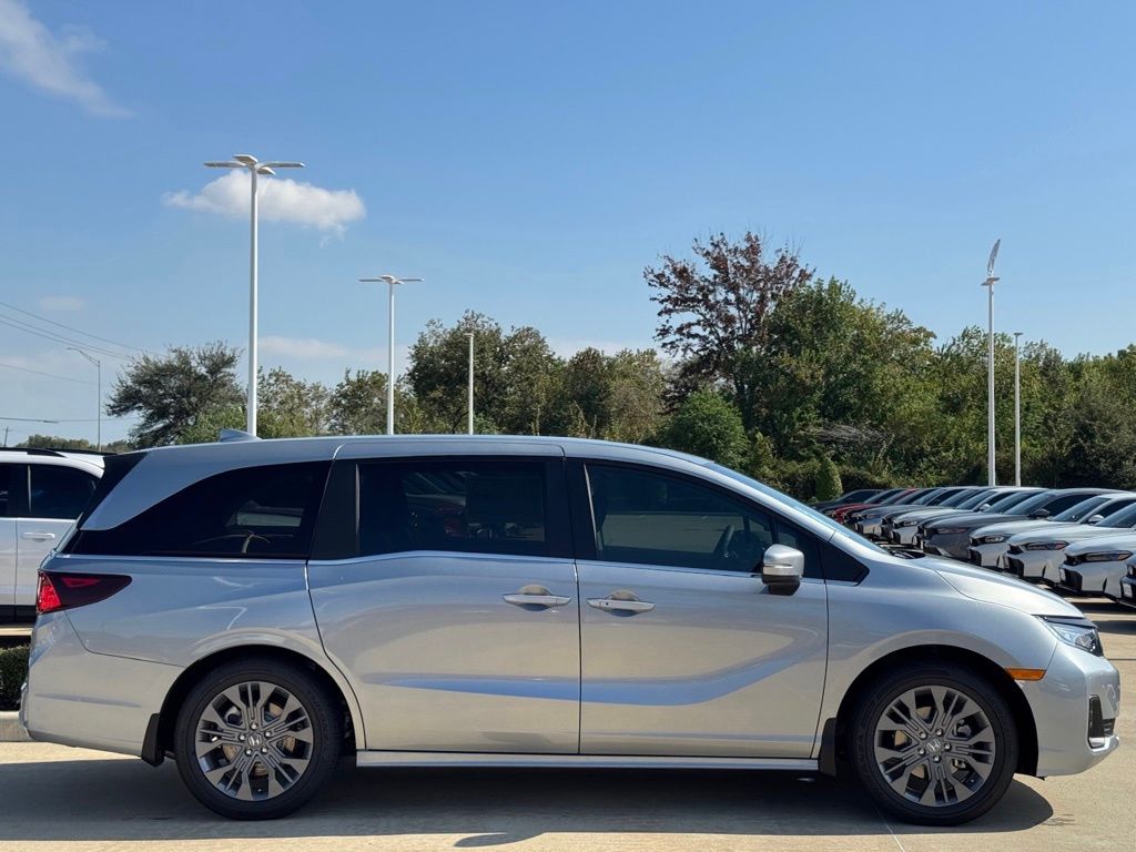 2026 Honda Odyssey Touring Silver at AutoSavvy Houston Southwest