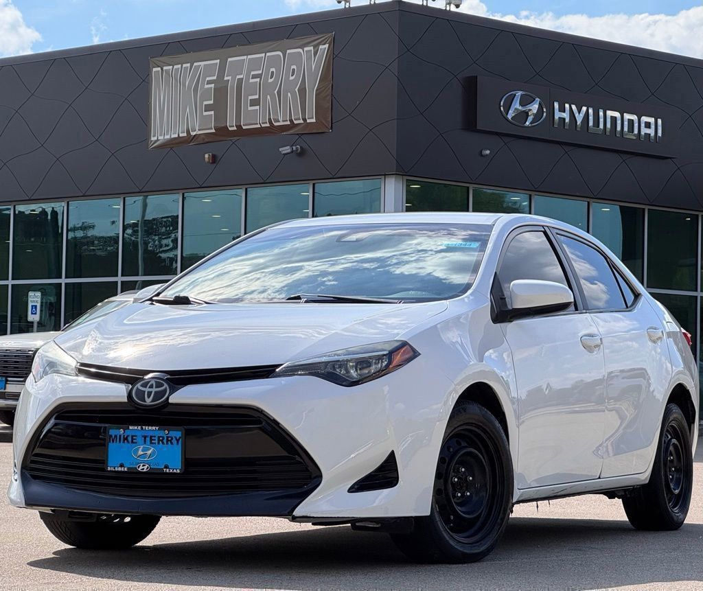 Super White 2018 Toyota Corolla LE Sedan Front-Wheel Drive Continuously Variable Transmission