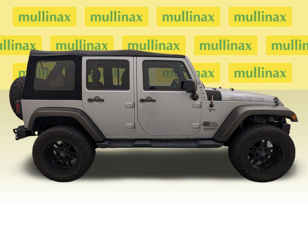 Used 2015 Jeep Wrangler Unlimited Sport with VIN 1C4BJWDG0FL742695 for sale in Kissimmee, FL