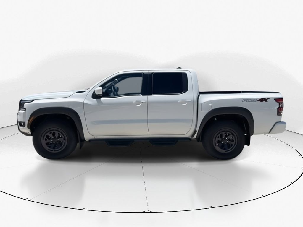 2025 Glacier White Nissan Frontier PRO-4X 4X4 Truck