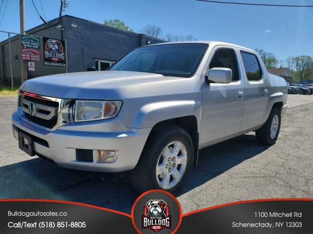 Silver 2011 Honda Ridgeline Pickup Truck Four-Wheel Drive 5-Speed Automatic Overdrive