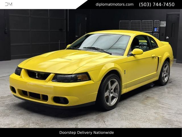 Yellow 2003 Ford Mustang SVT Cobra Coupe 6-Speed Manual Overdrive