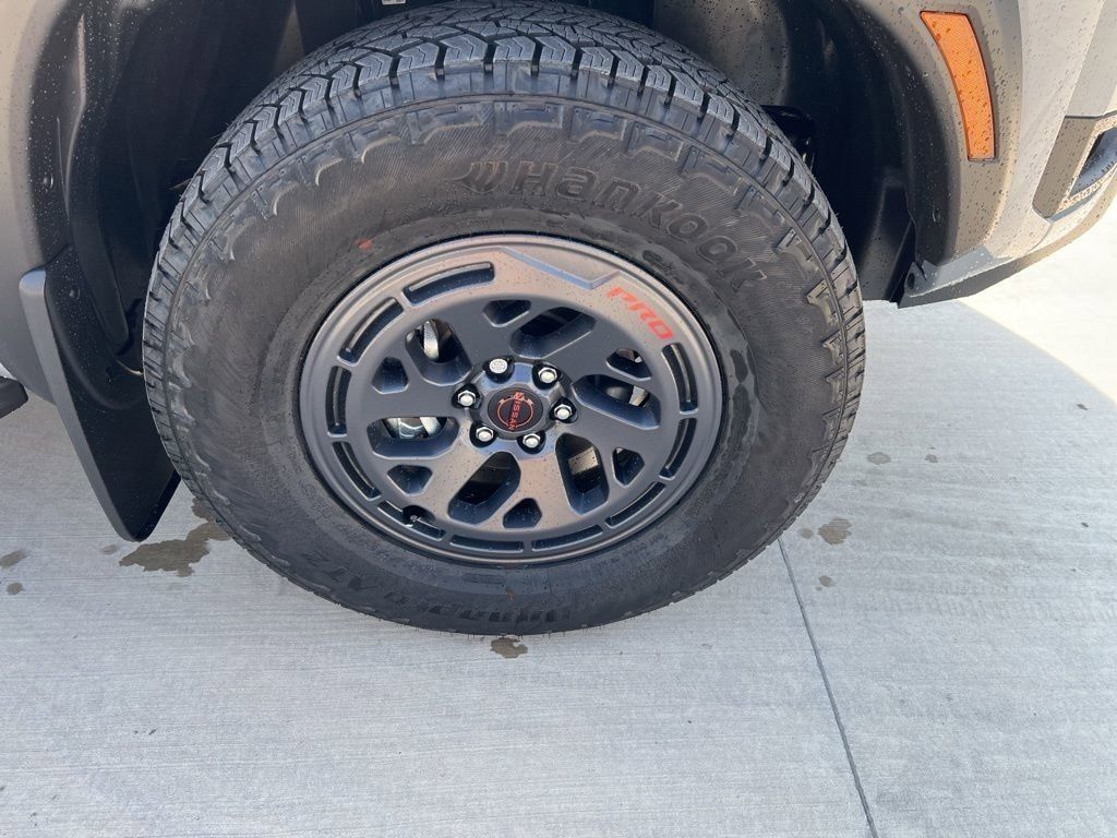 2025 Boulder Gray Pearl Nissan Frontier PRO-4X 4X4 Truck
