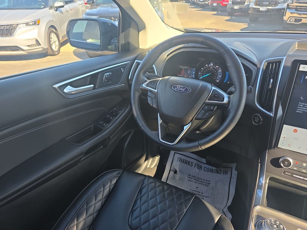 Certified Used 2024 Blue Ford Titanium image 22