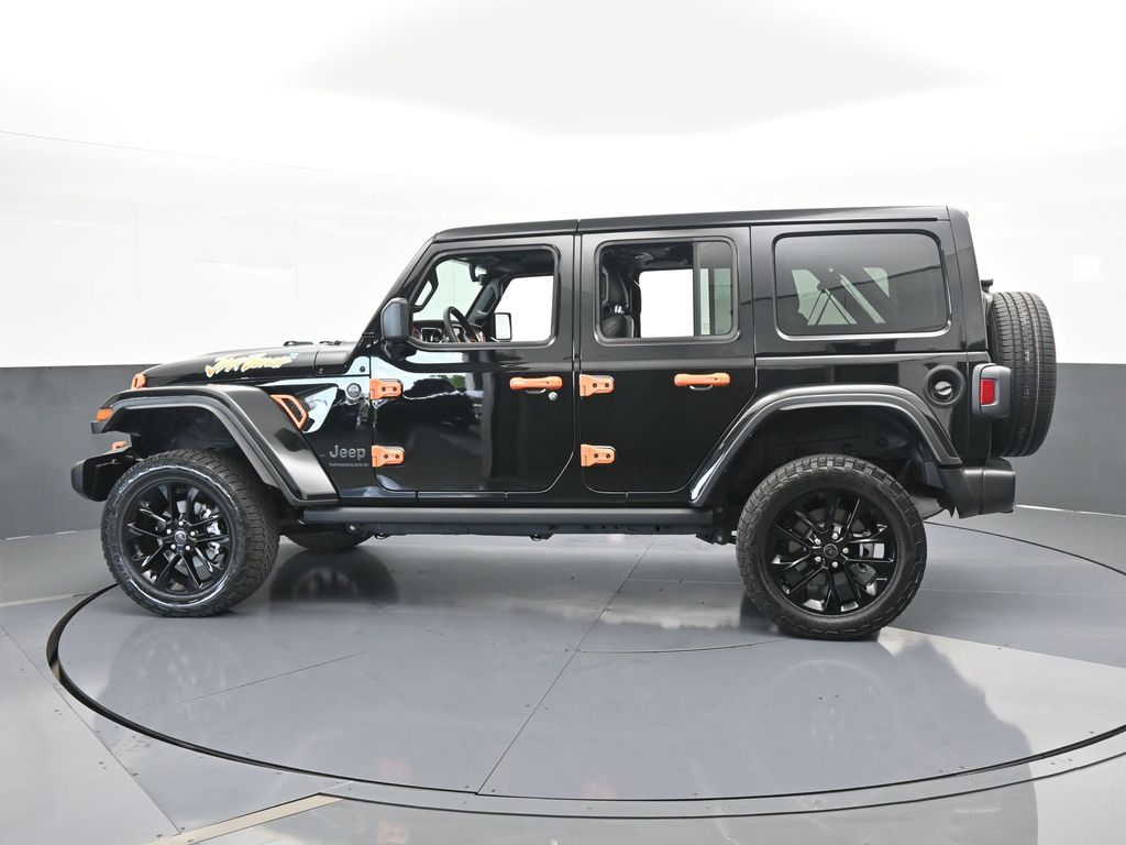 Used 2023 Jeep Wrangler 4-Door Sport with VIN 1C4HJXDG0PW665911 for sale in Miami, FL