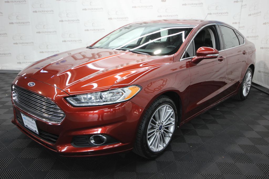 Red (Sunset Metallic) 2014 Ford Fusion Sedan Front-Wheel Drive 6-Speed Automatic